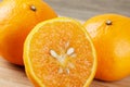 Close up of Mandarin Oranges isolated on wooden background