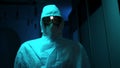 Close-up of mannequin in protective suit. Stock footage. Creepy eyes of mannequin are visible in protective glasses and