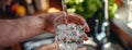 Man Pouring Water Into a Glass Royalty Free Stock Photo