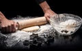 Close up of mans hands kneading dough with rolling pin Royalty Free Stock Photo