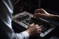 Close up of a mans hands repairing a computer motherboard. A closeup shot of a young male engineer hand working on motherboard, AI