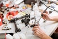 Close up of mans hands soldering drone chips and details