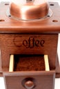 A close up of a manual coffee grinder burr mill machine with catch drawer, conical burr mill and spice hand grinding Royalty Free Stock Photo