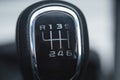 Close up of the manual gearbox transmission handle. Accelerator handle and buttons in a new car. Auto interior detail. Royalty Free Stock Photo