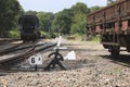 Close-up of a manual operated siding and an old train wagon Royalty Free Stock Photo