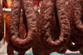 Close up of many chorizos sausages hung in butcher& x27;s shop
