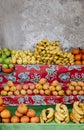 Close-up of many fresh fruits displayed on shelves