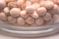 Close up of many pigeon peas in glass container Royalty Free Stock Photo
