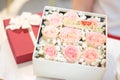 Close up many pink rose in the red gift box with ribbon for flower background or texture - Happy valentine`s day concept Royalty Free Stock Photo