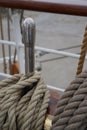 Close up of many ropes coiled up on board of a sailing tall ship Royalty Free Stock Photo