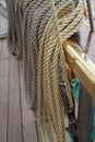 Close up of many ropes coiled up on board of a sailing tall ship Royalty Free Stock Photo
