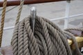 Close up of many ropes coiled up on board of a sailing tall ship Royalty Free Stock Photo