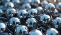 Close up of many silver shiny metallic balls reflect ambient light, blue sky. Create abstract pattern. Chrome metal texture Royalty Free Stock Photo
