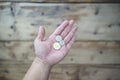 Close-up of many Thai baht coins in the hands of man Royalty Free Stock Photo