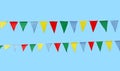 Multicolor festive flags over blue sky Royalty Free Stock Photo