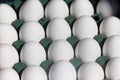 Close-up of many white eggs background. Royalty Free Stock Photo