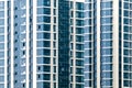 Close-up of many windows on a facade of new apartment building Royalty Free Stock Photo
