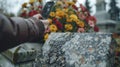 Close-up of marble tombstone with QR code, smartphone scanning, blurred flowers symbolize remembrance. Digital memory
