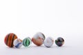 Close up marbles balls toys isolated white background Royalty Free Stock Photo