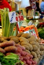 Market stall with potatoes and vegetables for sale Royalty Free Stock Photo
