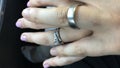 Close up of married couple holding hands Royalty Free Stock Photo