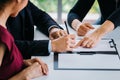 Married couple signing divorce agreement with agent