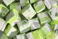 Marshmallow cubes, green kiwi fruit sweet dessert in sunlight Royalty Free Stock Photo