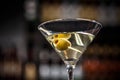 Martini cocktail with green olives Royalty Free Stock Photo