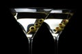 Close up Martini cocktails with olives isolated on black Royalty Free Stock Photo