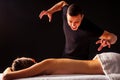 Close-up masseur hands doing back massage to female client in spa center Royalty Free Stock Photo