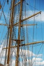 Close-up of a mast on traditional sailboats. The mast of large wooden ship. Beautiful travel picture with masts and rigging of Royalty Free Stock Photo