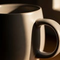 A close-up of a matte ceramic mug, highlighting its handle and smooth Royalty Free Stock Photo