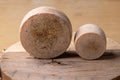 close up of maturated selection of cheese on old wood