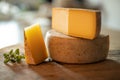 close up of maturated selection of cheese on old wood