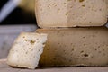 close up of maturated selection of cheese on old wood