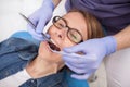 Professional dentist having appointment with patient