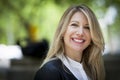 Close Up Of A mature Happy Blond Woman Smiling At The Camera. Thirties. Royalty Free Stock Photo