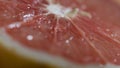 Close-up of mature juicy pink grapefruit cut in a half