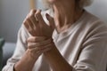 Close up of elderly woman check pulse on wrist