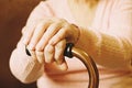 Close up of mature womans hands. Health care giving, nursing home. Parental love of grandmother. Old age related diseases. Royalty Free Stock Photo