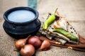 Close up of meal or lunch of villager or a typical farmer on gunny bag`s background consisting of pearl millet`s roti or chapati Royalty Free Stock Photo