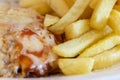 Meal on plate, parmegiana chicken, potato chips