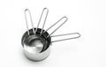 Close up measuring cups on white table Royalty Free Stock Photo