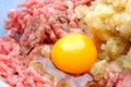 Close up meat and egg cooking process Royalty Free Stock Photo