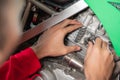 Close up of mechanic fixing a spark plugs cable Royalty Free Stock Photo