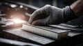 Close-up: Mechanic's Gloved Hand Installing a New Air Filter in a Car Engine Royalty Free Stock Photo
