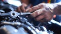 Close Up of Mechanic\'s Hand Working on Engine