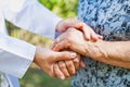 Shaking elderly hands Royalty Free Stock Photo