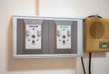 Close up of medical equipment, oxygen gas supply and vacuum on a wall at the hospital ward Royalty Free Stock Photo
