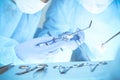 Close-up of medical team performing operation. Group of surgeons at work are busy of patient. Medicine, veterinary or Royalty Free Stock Photo